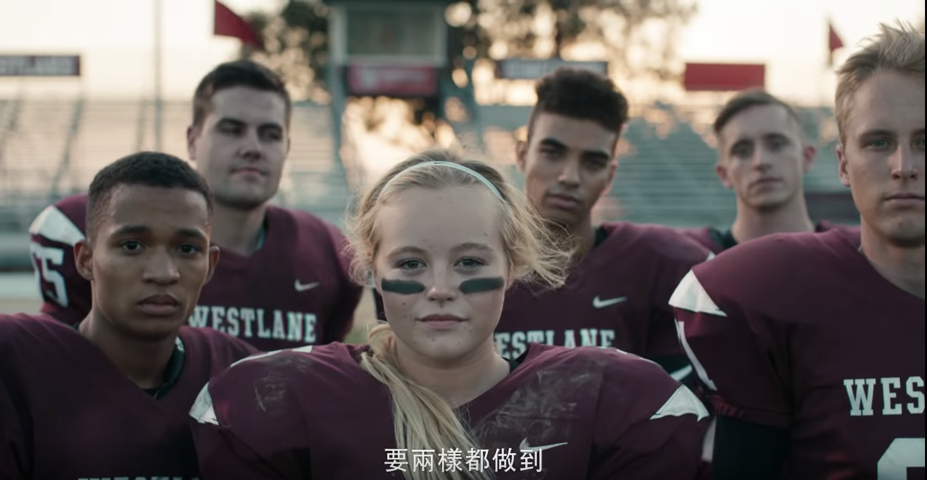 High school football players capture the essence of heroism as they pose for a photo.