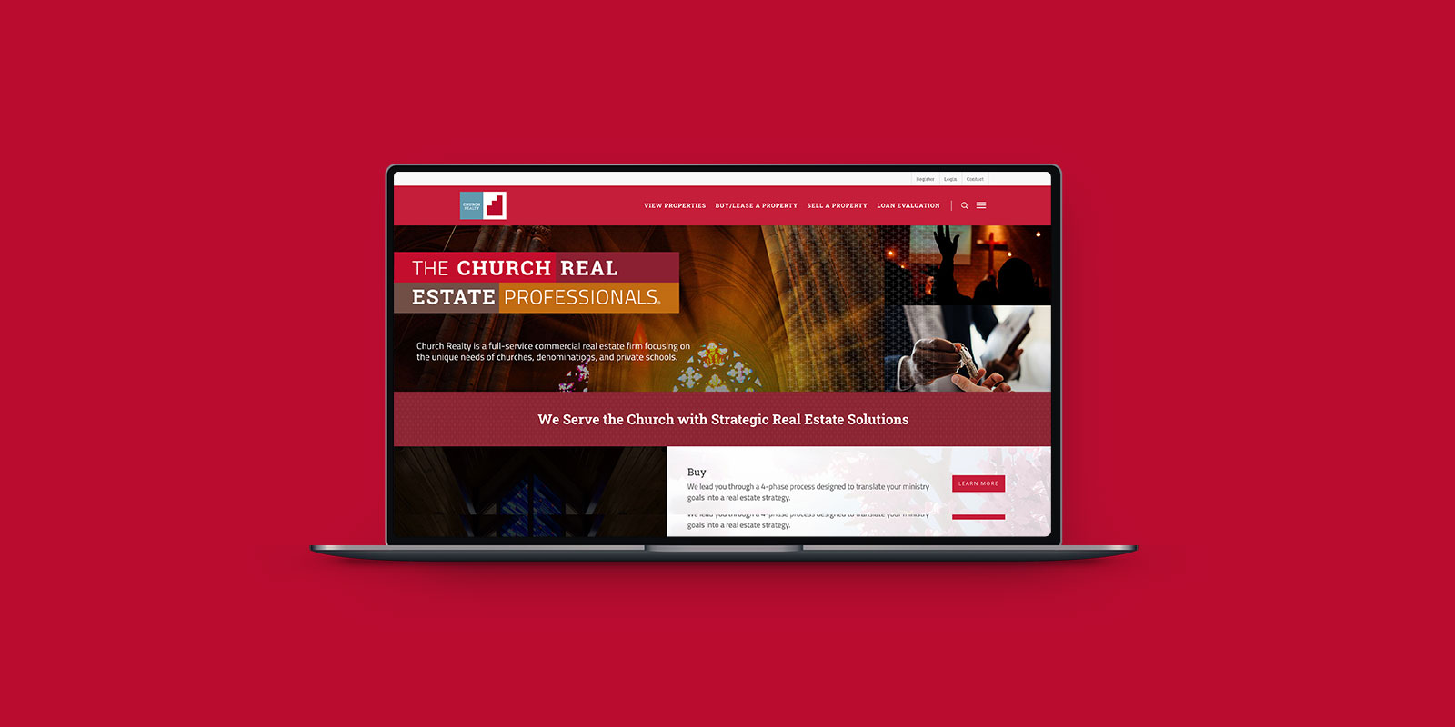 A laptop with a red background showcasing a website design project.