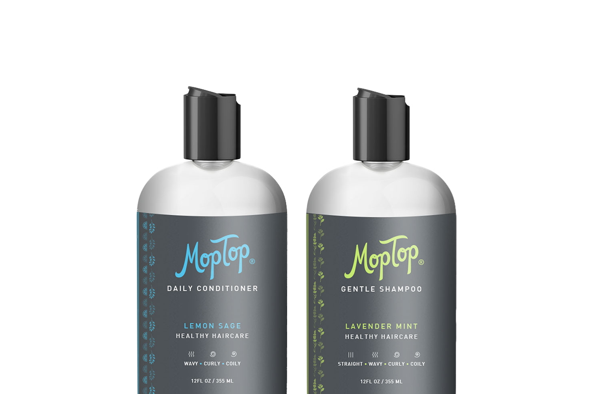 Two bottles of shampoo and conditioner with modern packaging design on a white background.